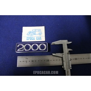 EMBLEM "2000"  METAL CHROME  BLUE BACKGROUND