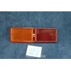 128 SEDAN 1°S  LENS FORREAR LEFT LIGHT   LEART
